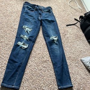 American Eagle jeans. Blue with 4 holes. Size 2.